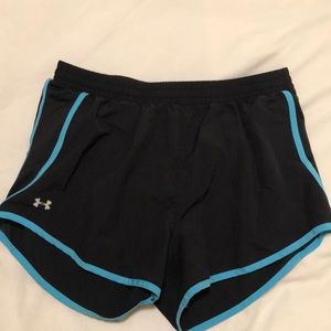 Under Armour running shorts.